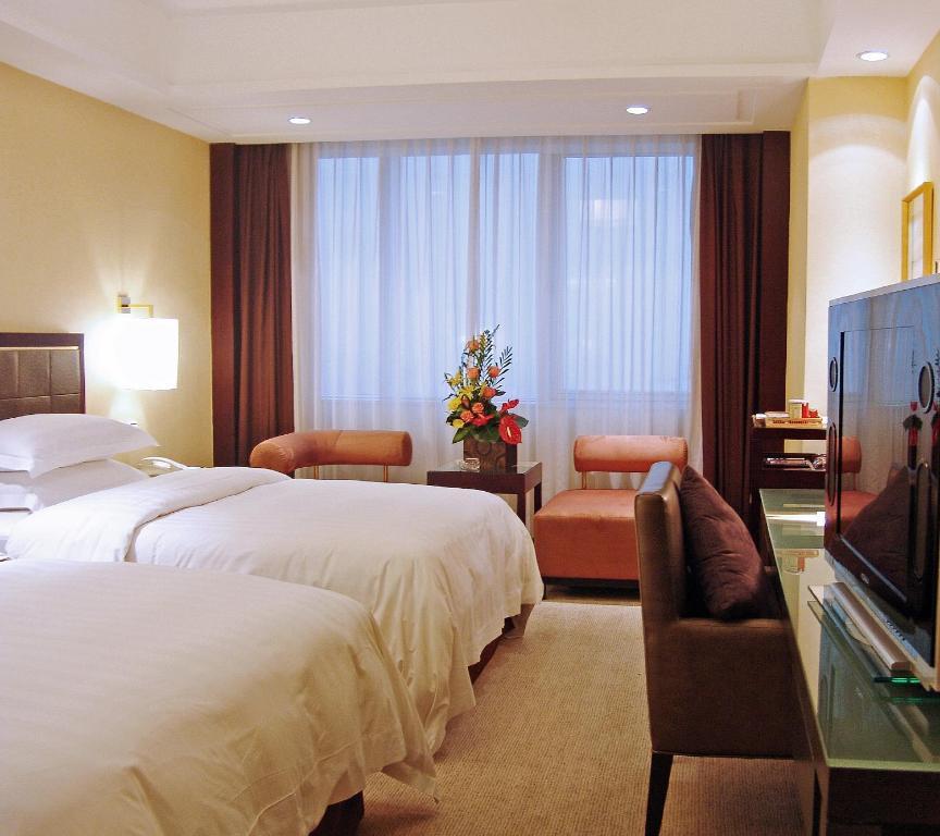 Guangzhou New Century Hotel Room photo